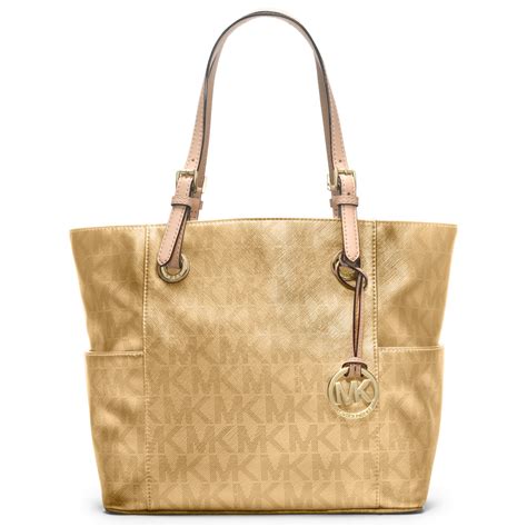 gold michael kors bag logo bar|Michael Kors gold leather handbags.